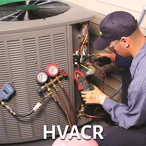 HVACR technician repairing air conditioner outdoor unit - link